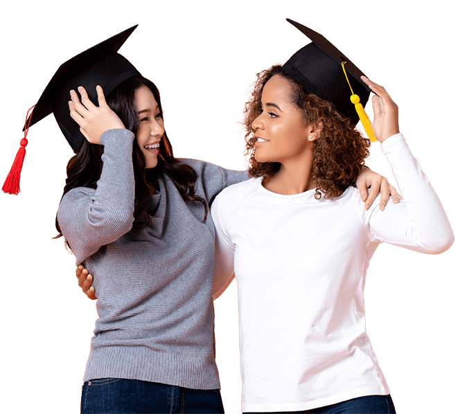 Two students with graduation caps hugging